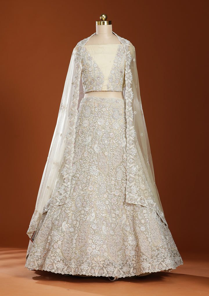 Off White Threadwork Net Semi-Stitched Lehenga