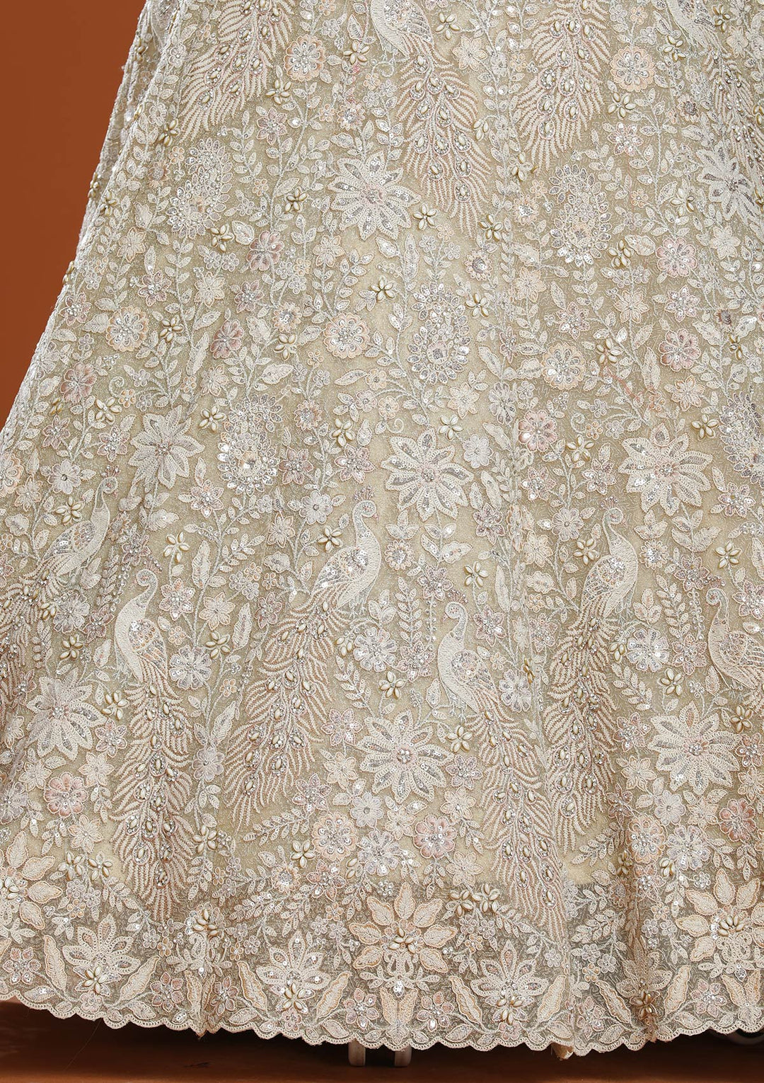 Off White Threadwork Net Semi-Stitched Lehenga