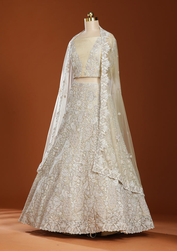 Off White Threadwork Net Semi-Stitched Lehenga