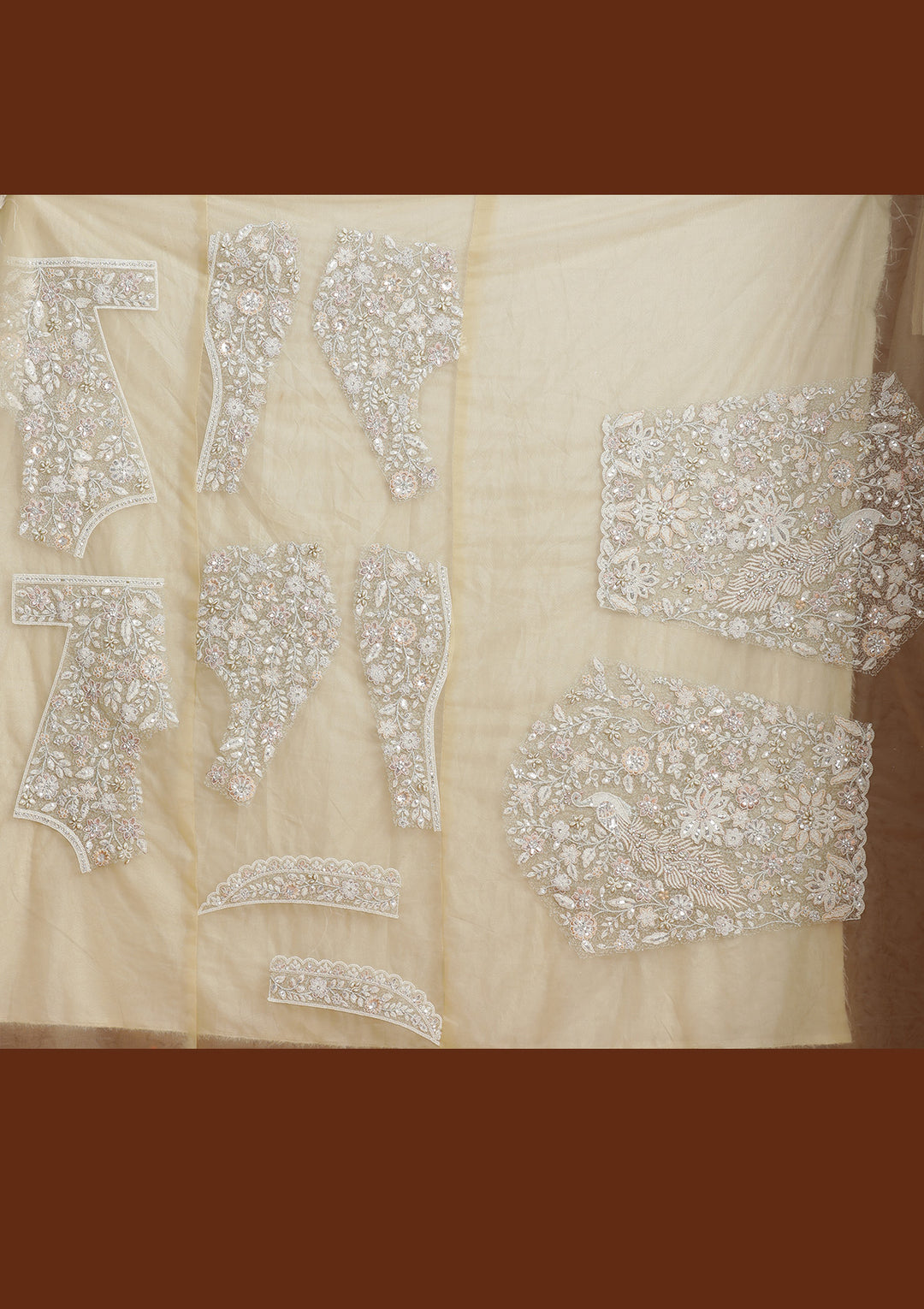 Off White Threadwork Net Semi-Stitched Lehenga