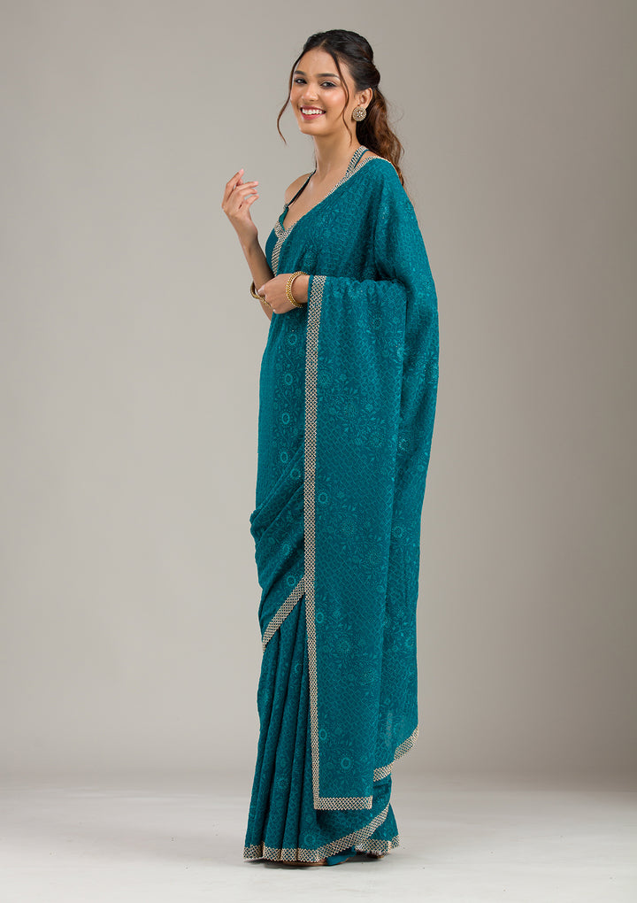 Teal Green Threadwork Georgette Saree
