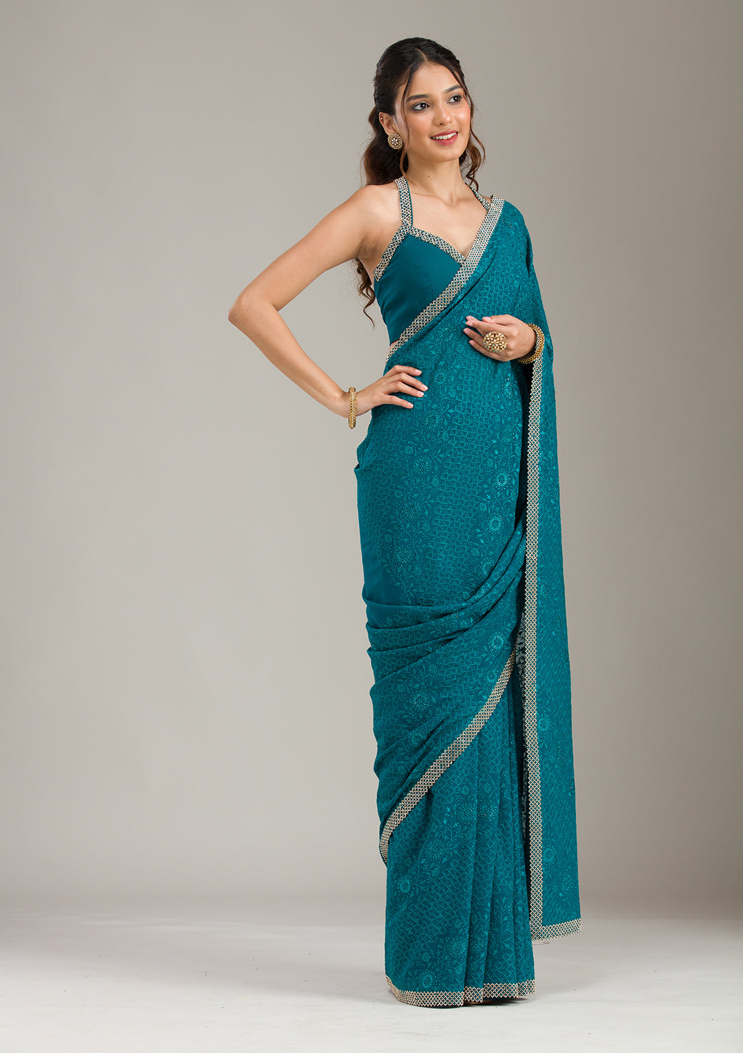 Teal Green Threadwork Georgette Saree