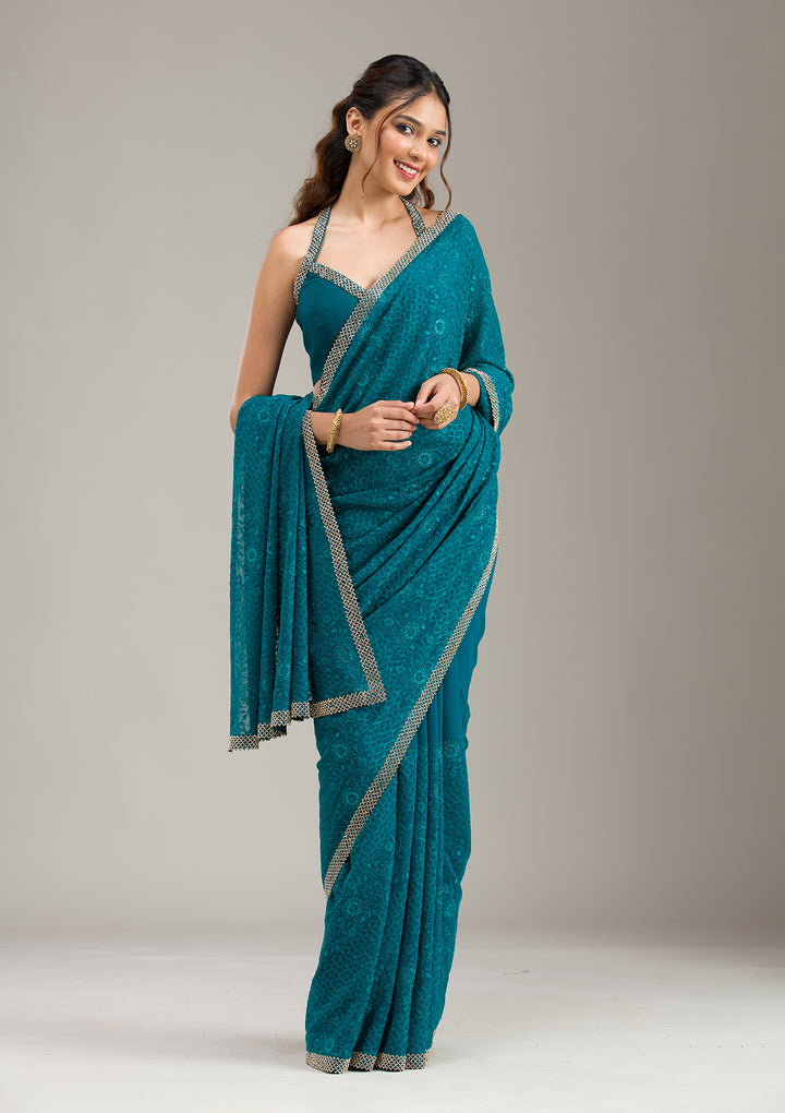 Teal Green Threadwork Georgette Saree