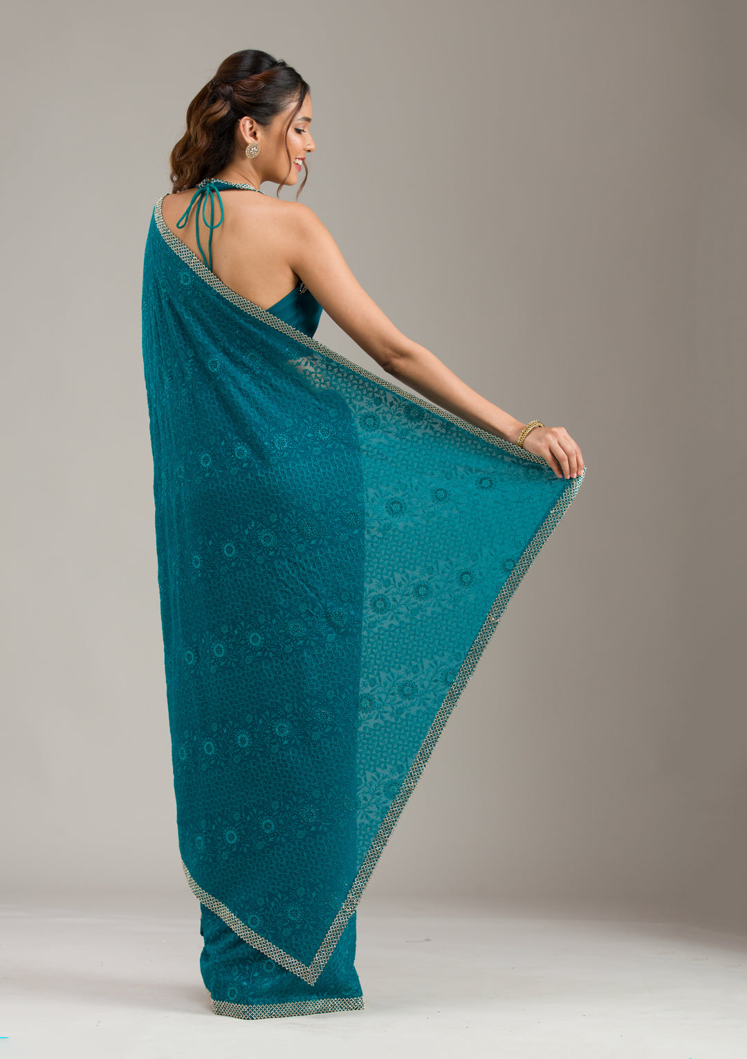 Teal Green Threadwork Georgette Saree