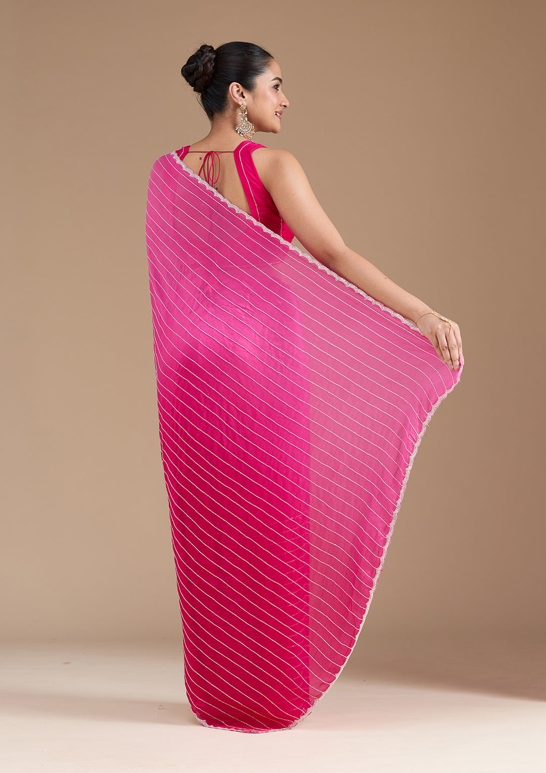 Rani Pink Cutdana Crepe Saree