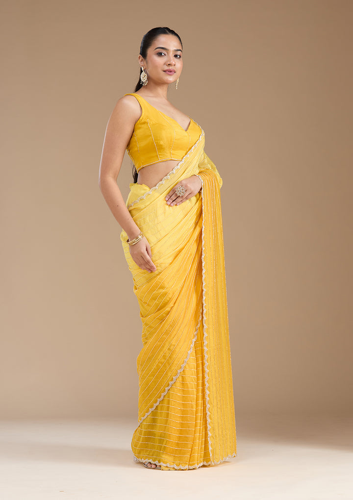 Yellow Cutdana Crepe Saree