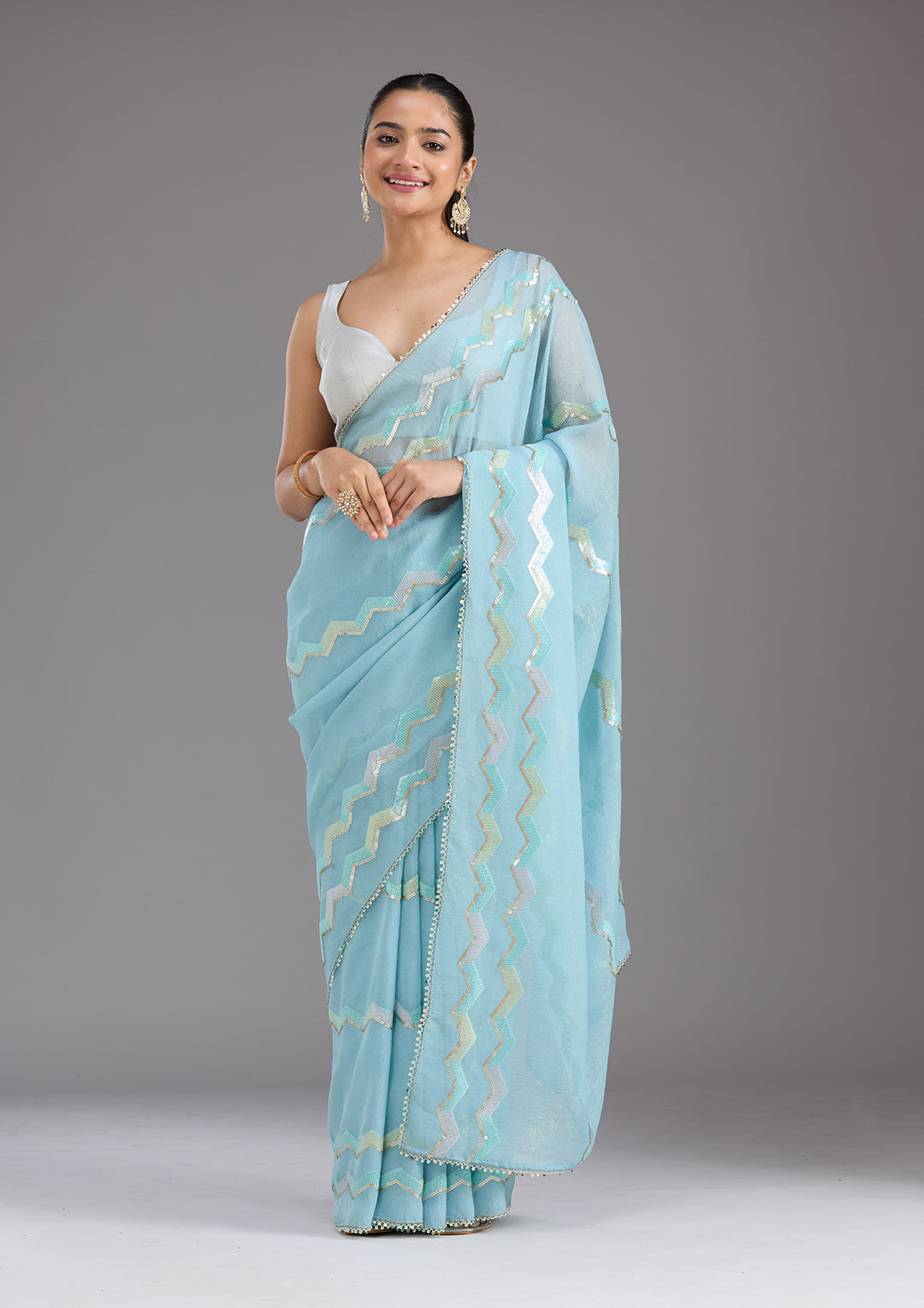 Sky Blue Sequins Semi Crepe Saree