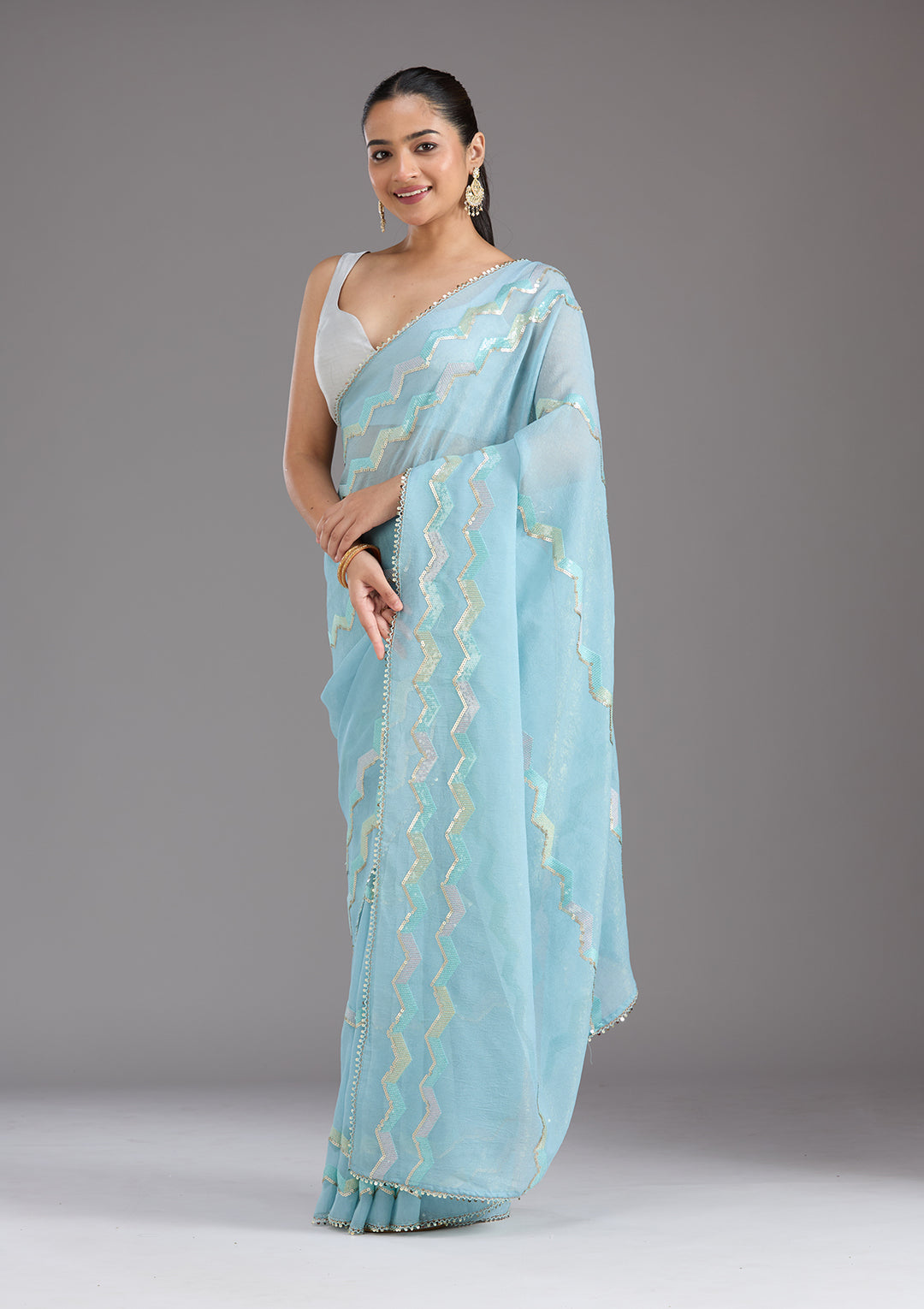 Sky Blue Sequins Semi Crepe Saree