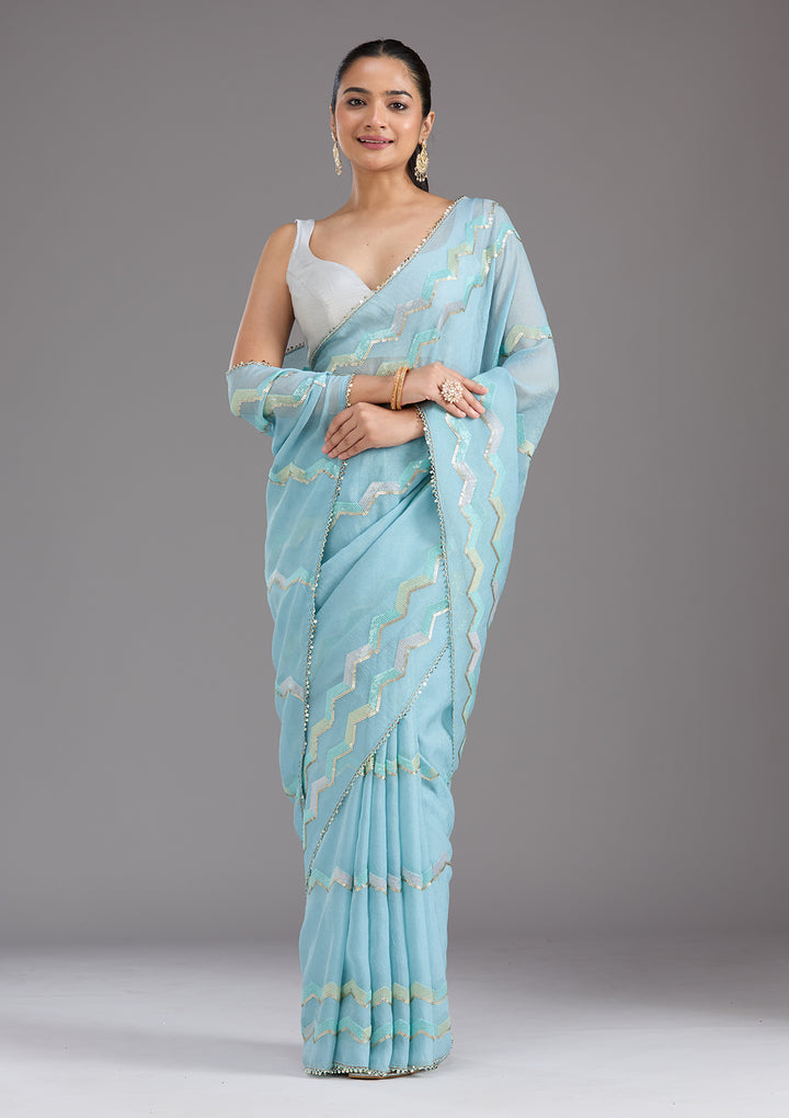Sky Blue Sequins Semi Crepe Saree