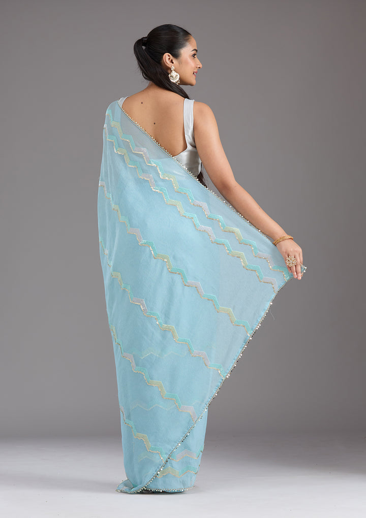 Sky Blue Sequins Semi Crepe Saree