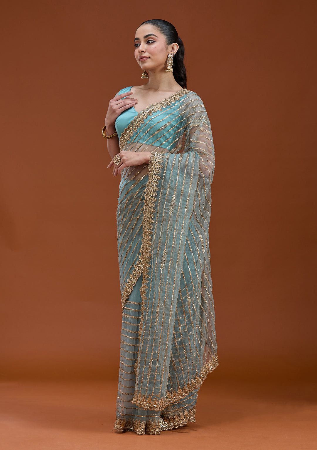 Sea Green Sequins Net Saree