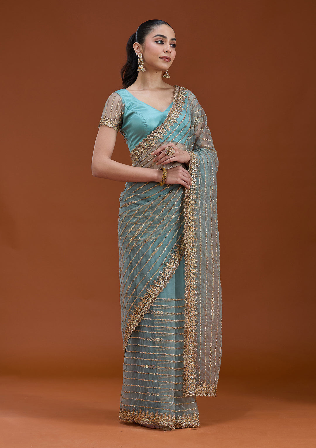 Sea Green Sequins Net Saree