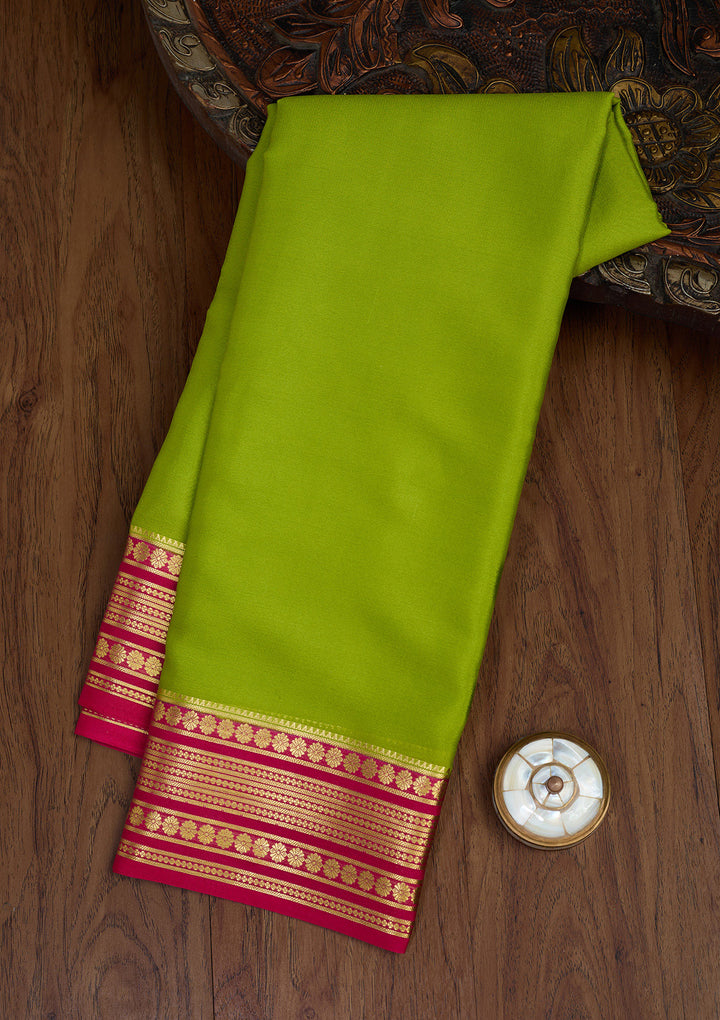 Parrot Green Zariwork Pure Crepe Silk Saree