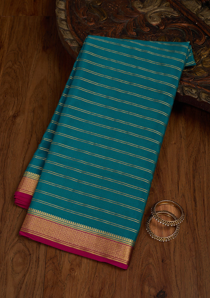 Peacock Green Zariwork Pure Crepe Silk Saree