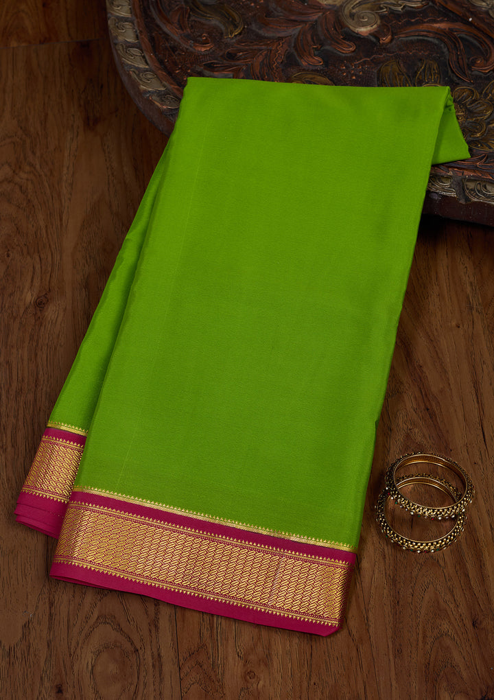 Parrot Green Zariwork Pure Crepe Silk Saree
