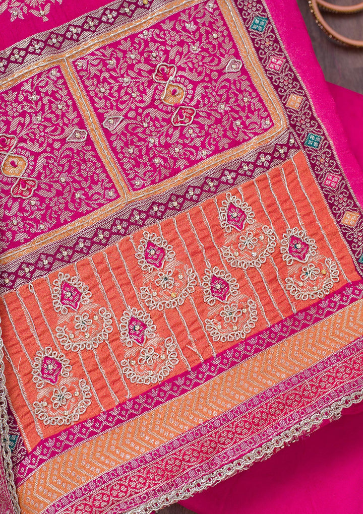 Rani Pink Cutdana Semi Crepe Unstitched Salwar Suit