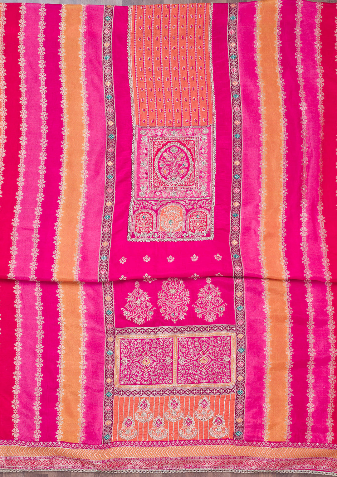 Rani Pink Cutdana Semi Crepe Unstitched Salwar Suit