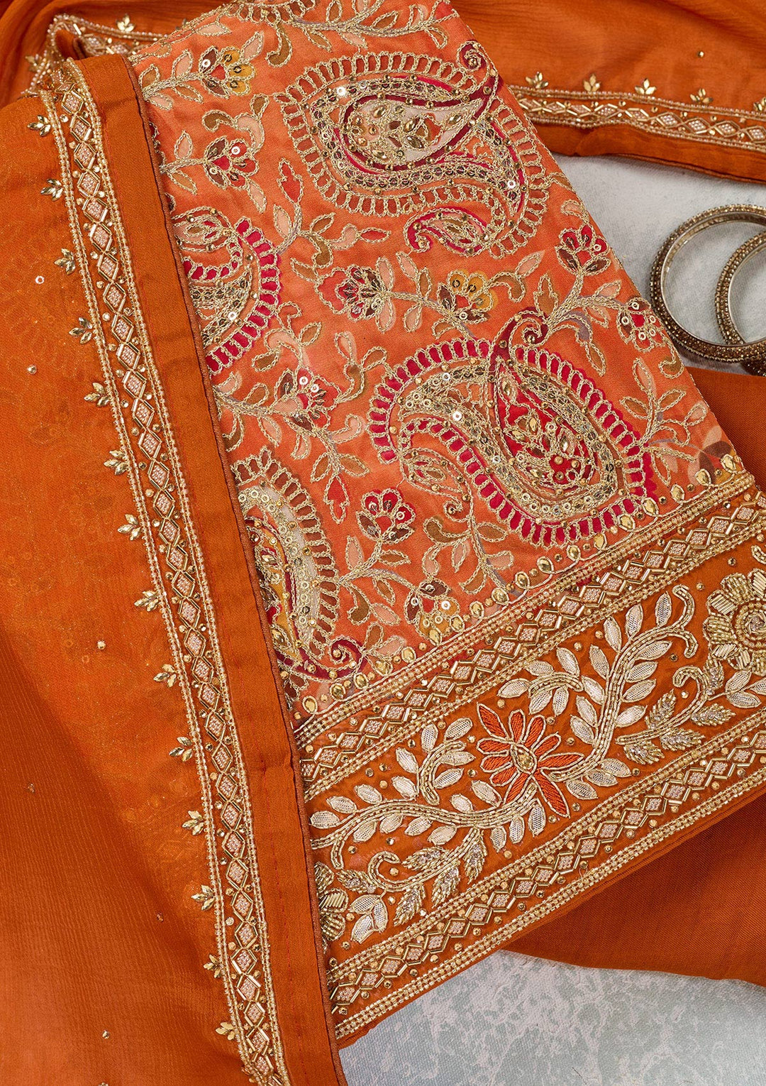 Orange Stonework Semi Crepe Unstitched Salwar Suit