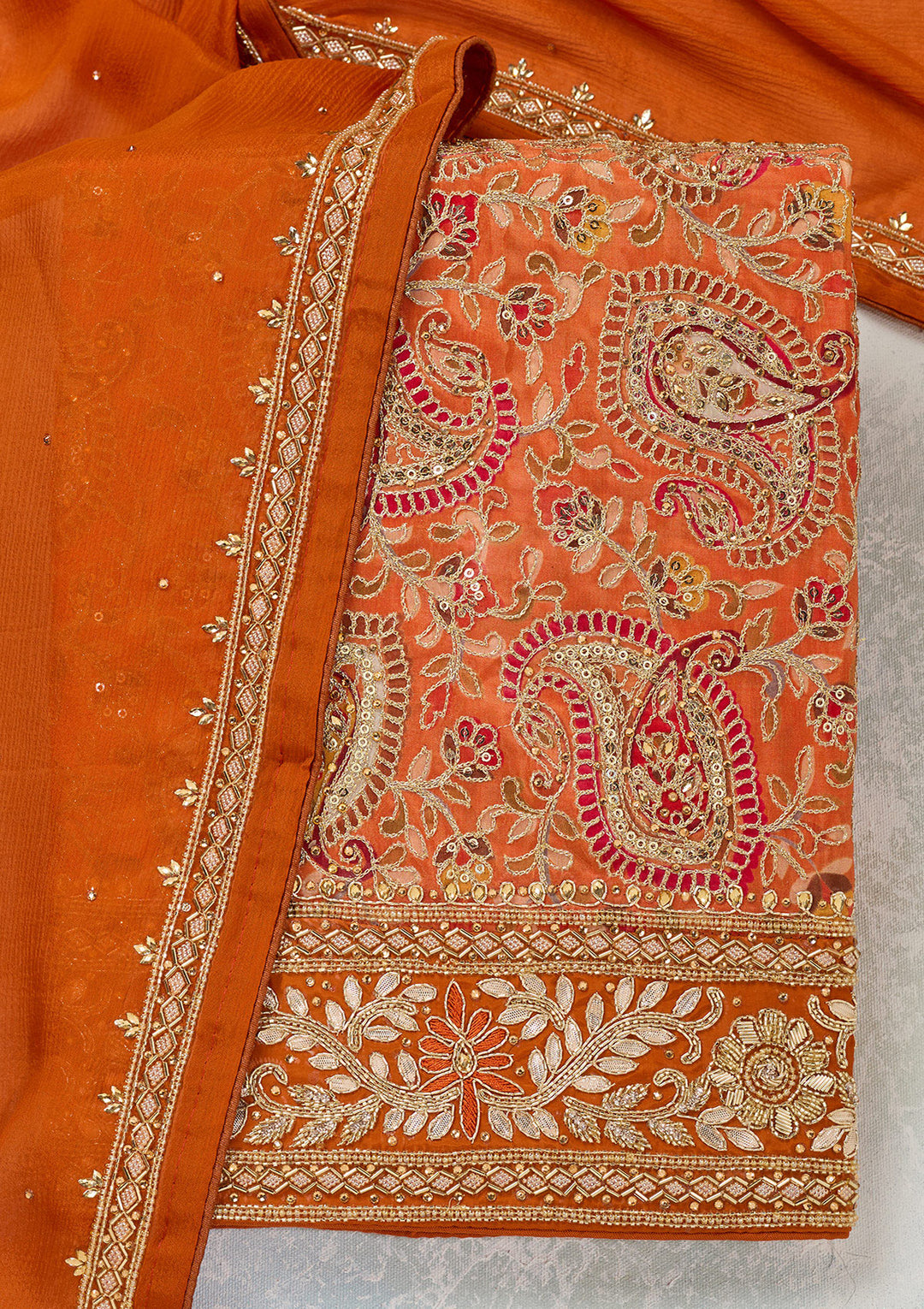 Orange Stonework Semi Crepe Unstitched Salwar Suit