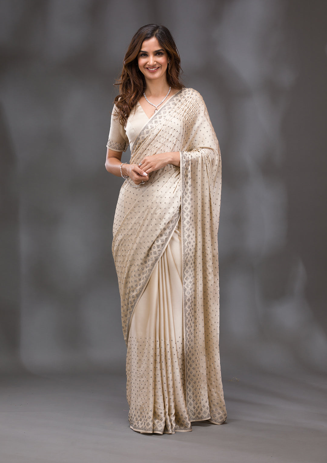 Beige Swarovski Crepe Saree