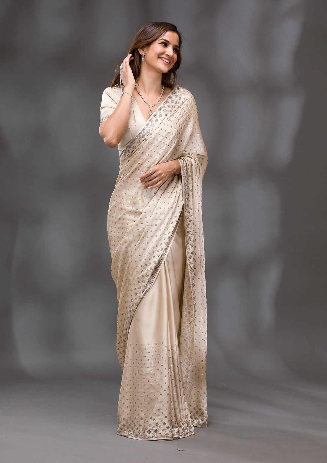 Beige Swarovski Crepe Saree