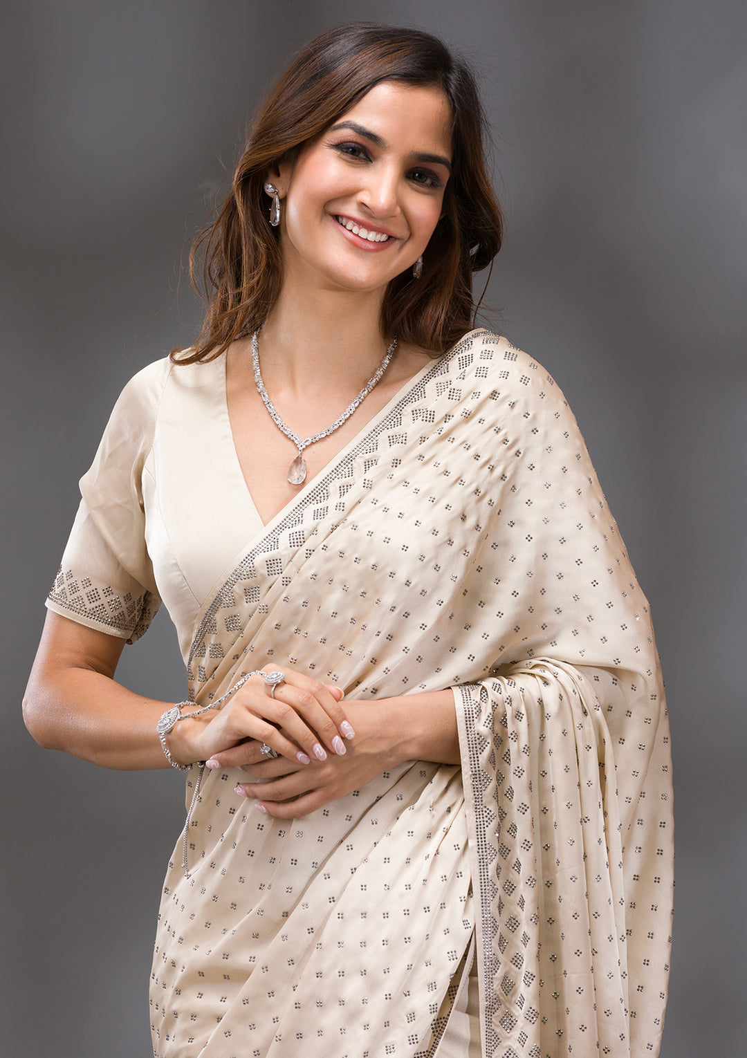 Beige Swarovski Crepe Saree