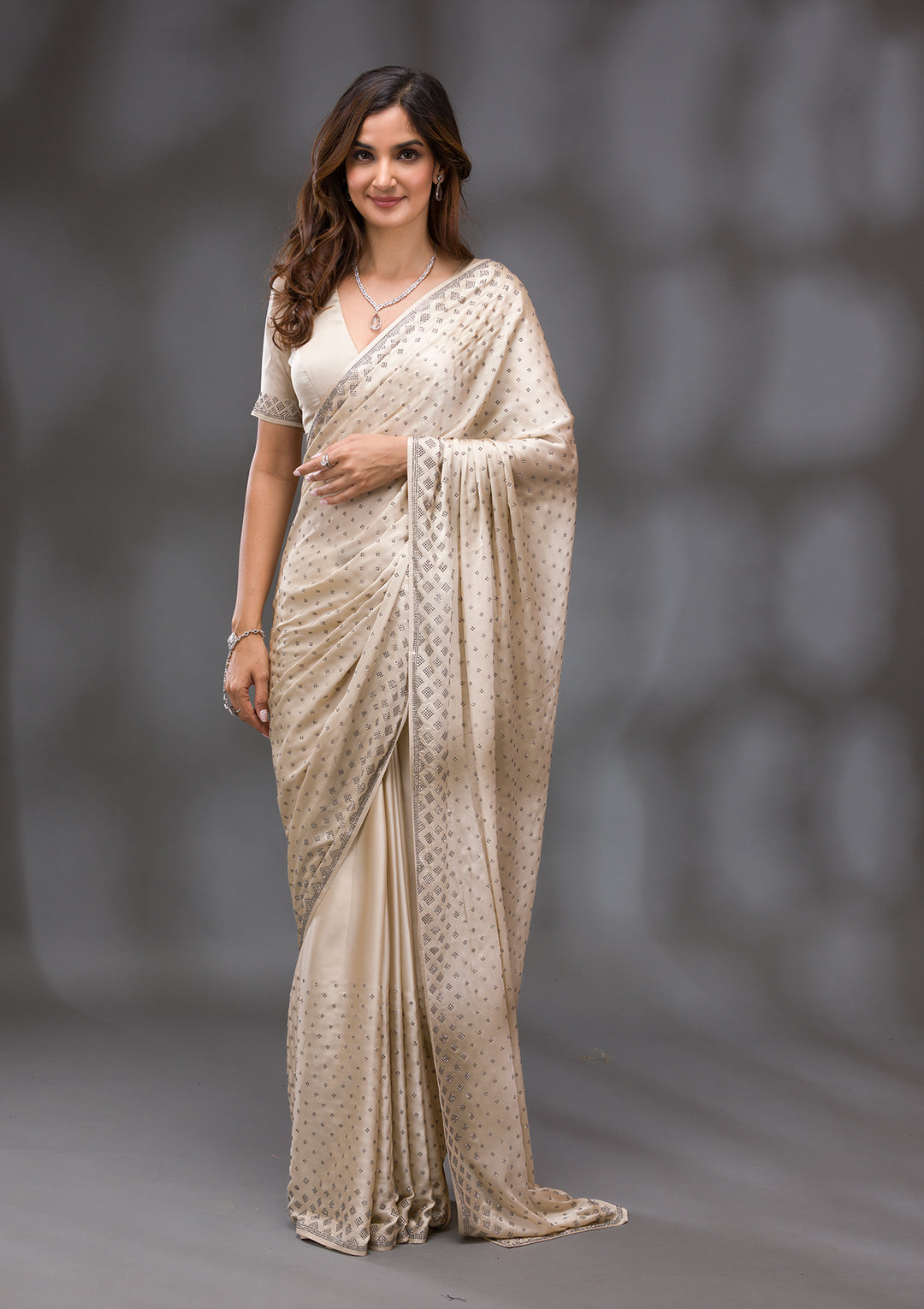 Beige Swarovski Crepe Saree