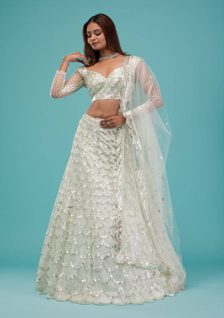 Cream Sequins Net Semi Stitched Lehenga