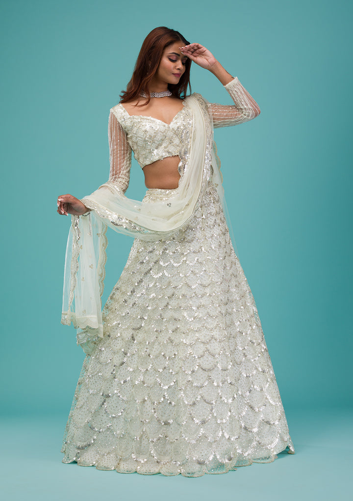 Cream Sequins Net Semi Stitched Lehenga