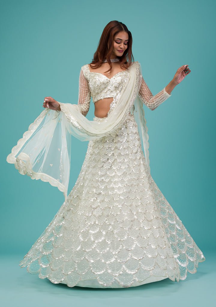 Cream Sequins Net Semi Stitched Lehenga