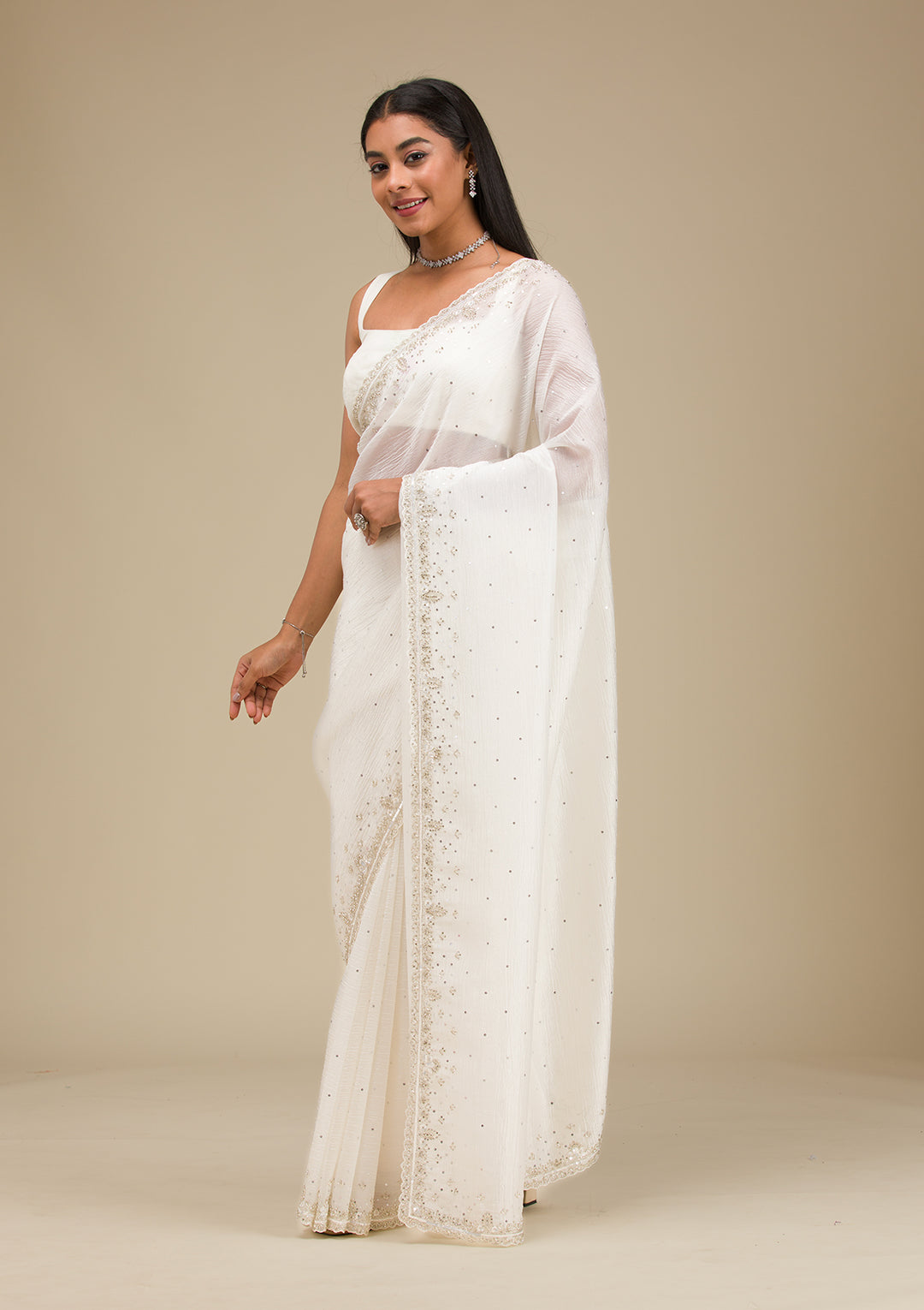 Off White Cutdana Georgette Saree