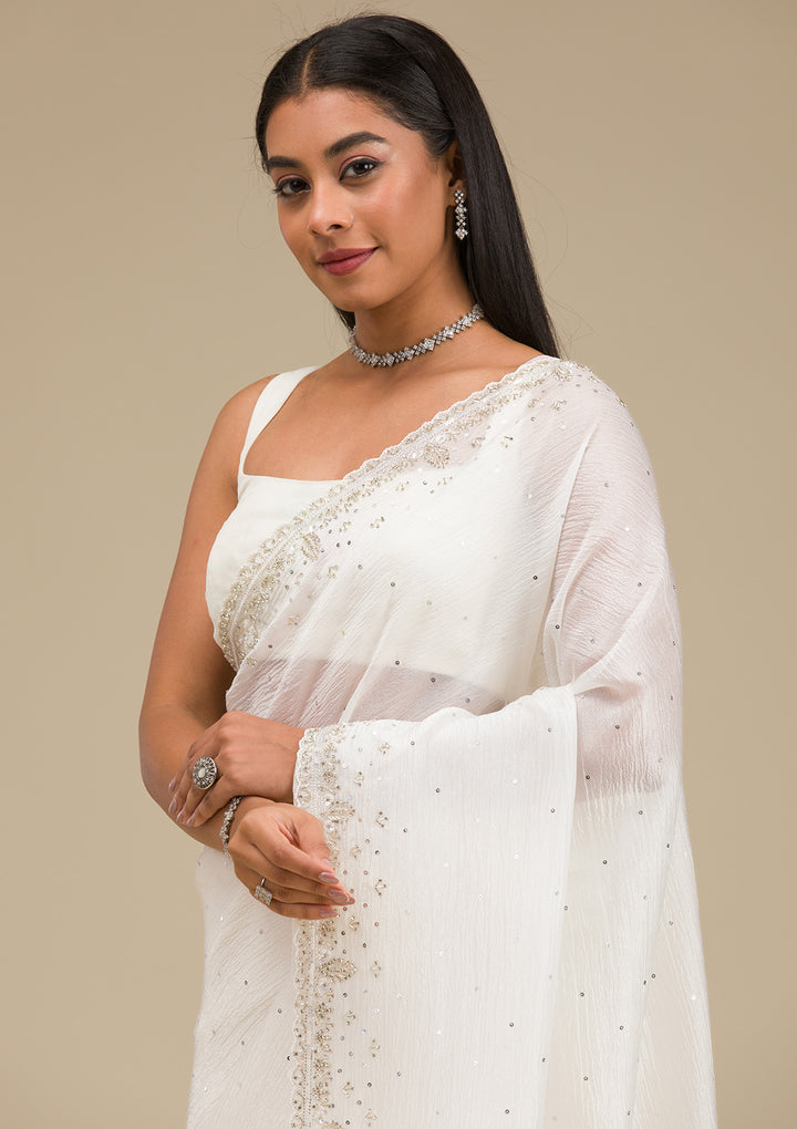 Off White Cutdana Georgette Saree