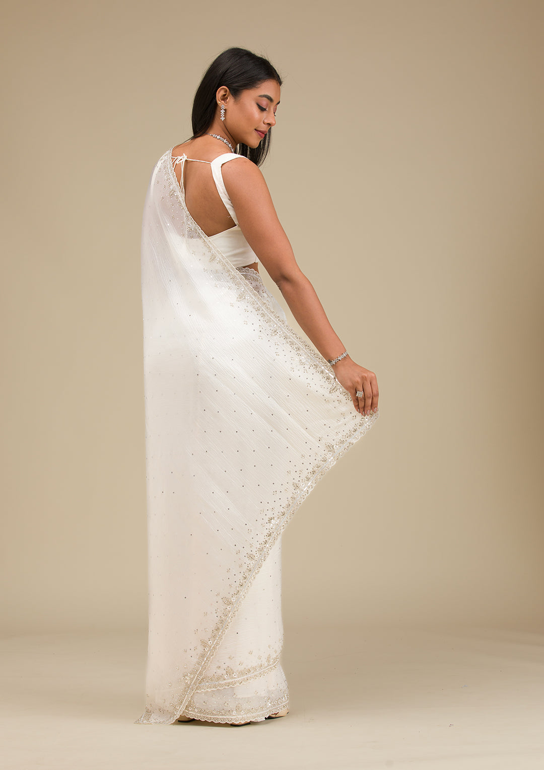 Off White Cutdana Georgette Saree