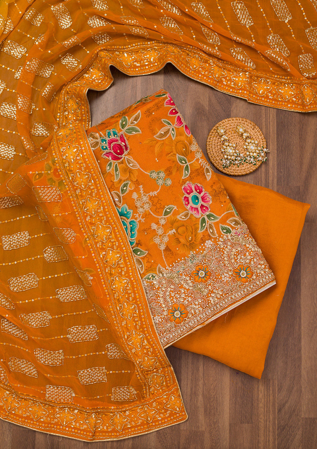 Orange Printed Semi Crepe Unstitched Salwar Suit
