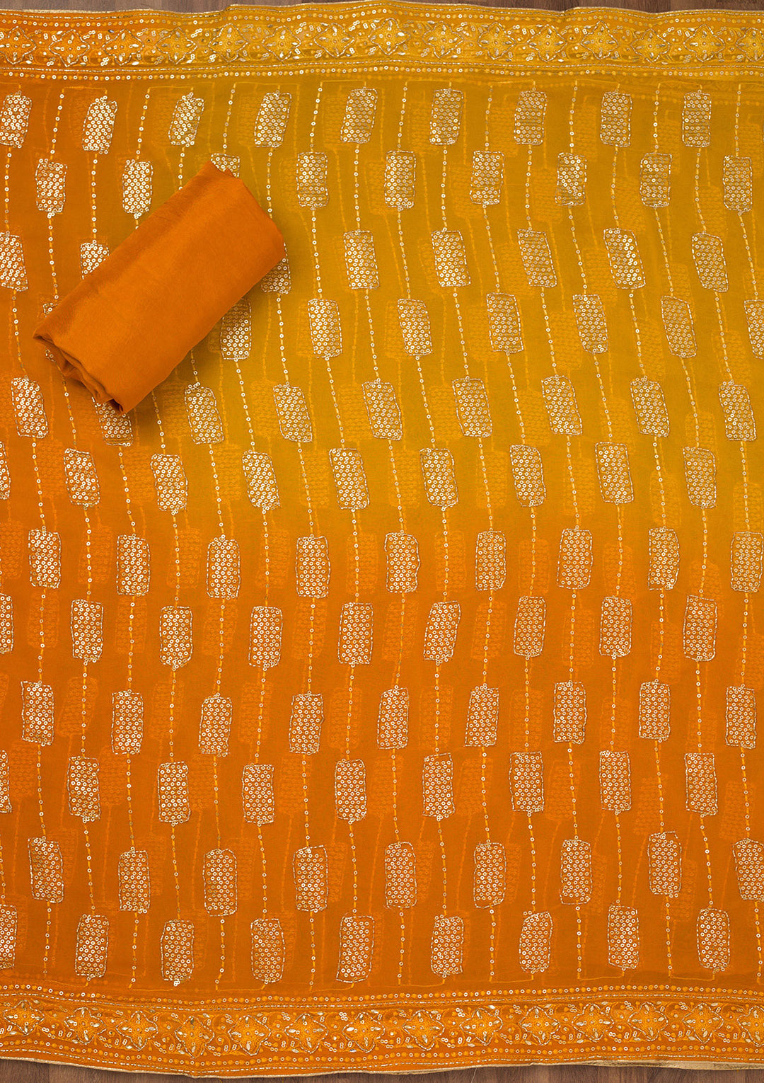 Orange Printed Semi Crepe Unstitched Salwar Suit