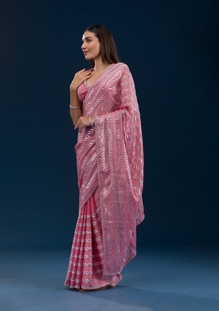Peach Sequins Semi Crepe Saree
