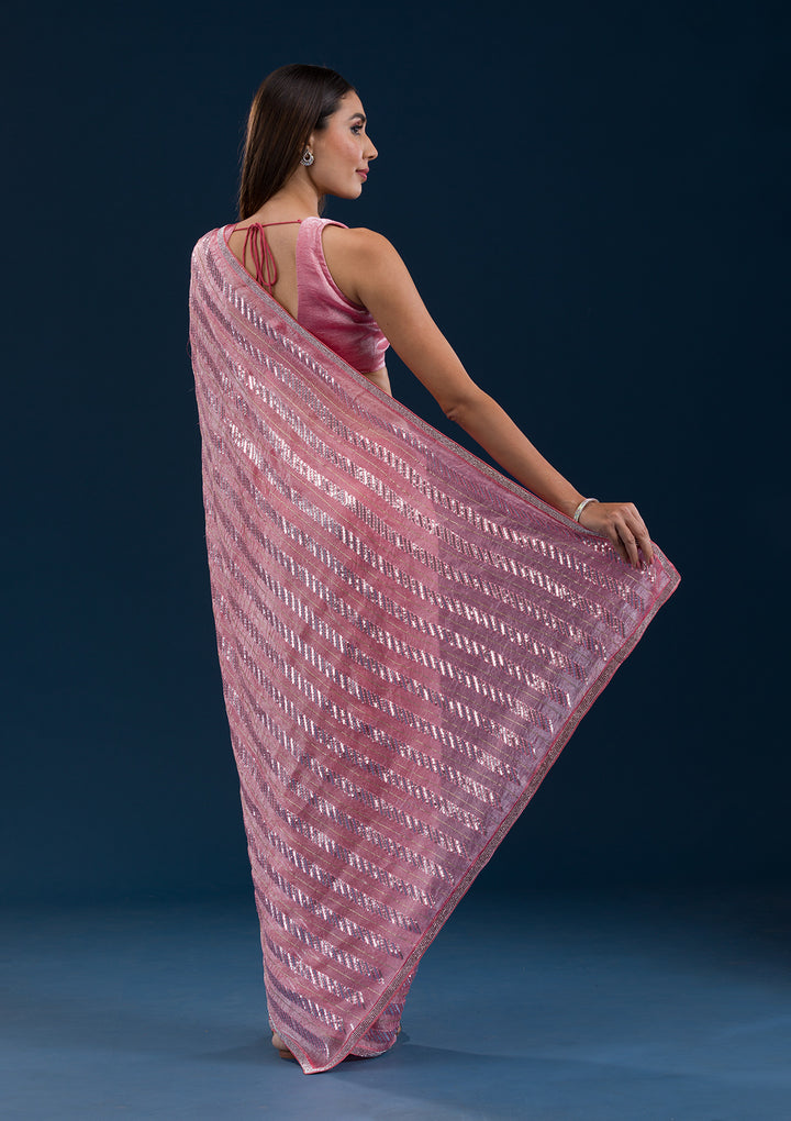 Peach Sequins Semi Crepe Saree