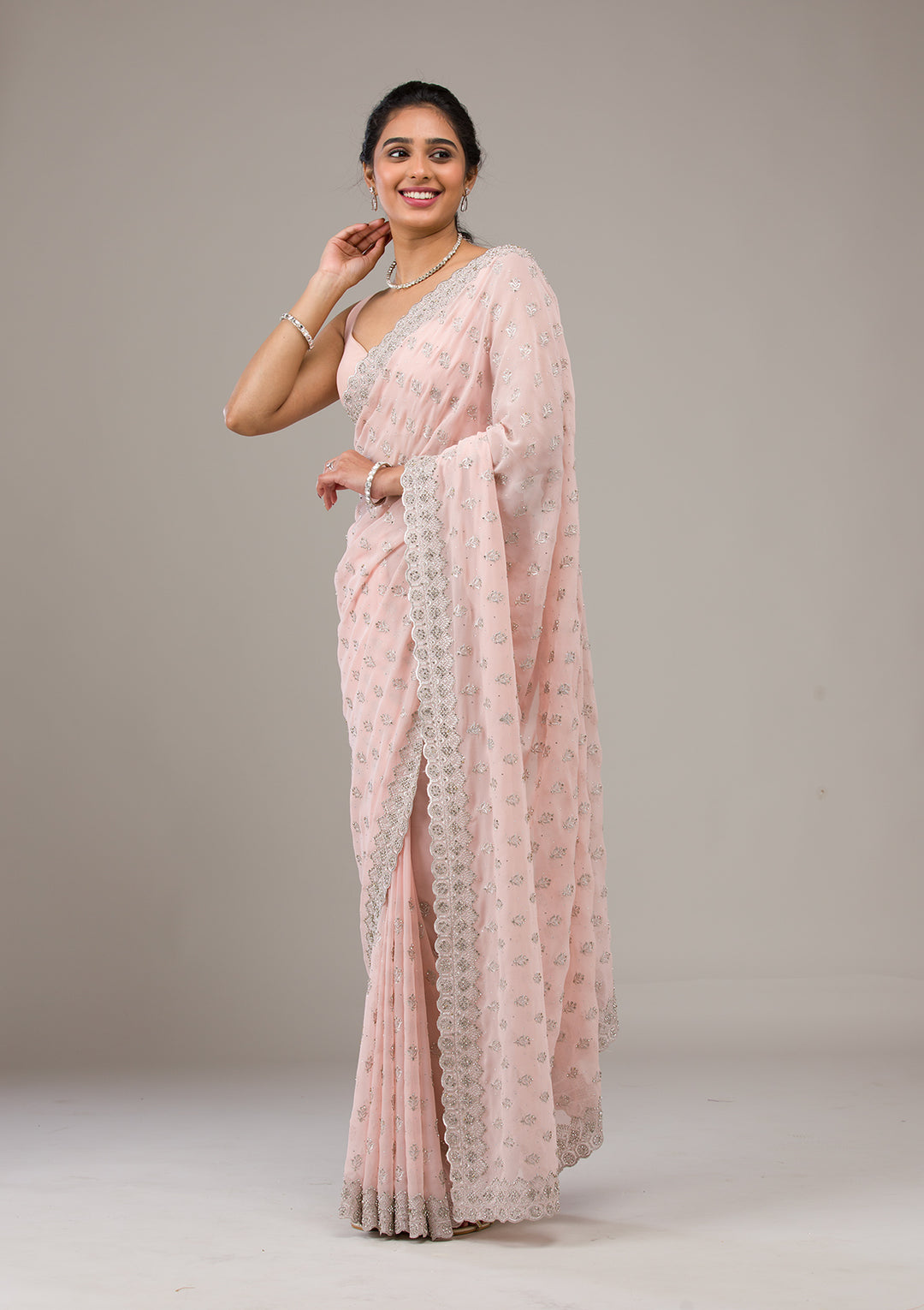 Peach Stonework Georgette Saree
