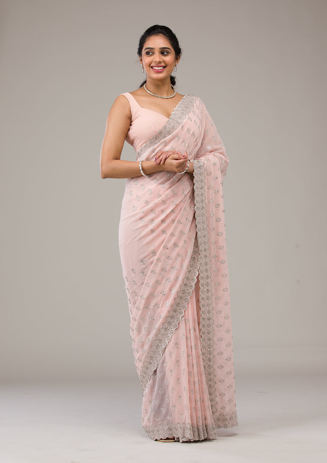 Peach Stonework Georgette Saree