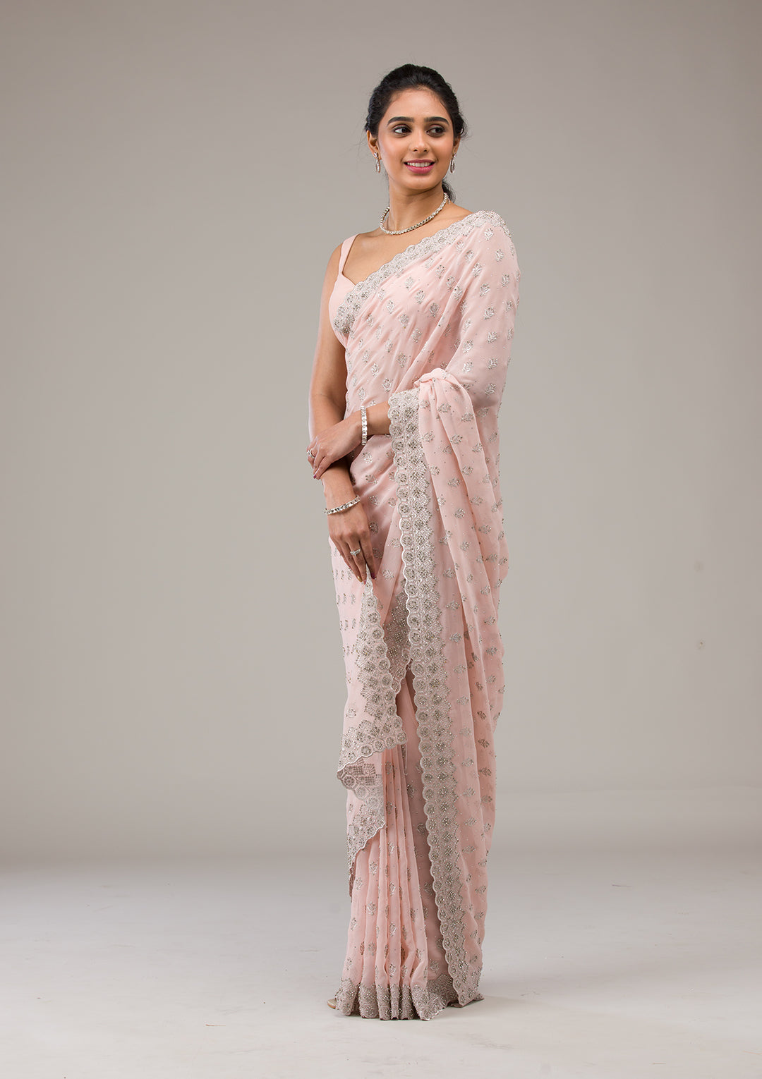 Peach Stonework Georgette Saree