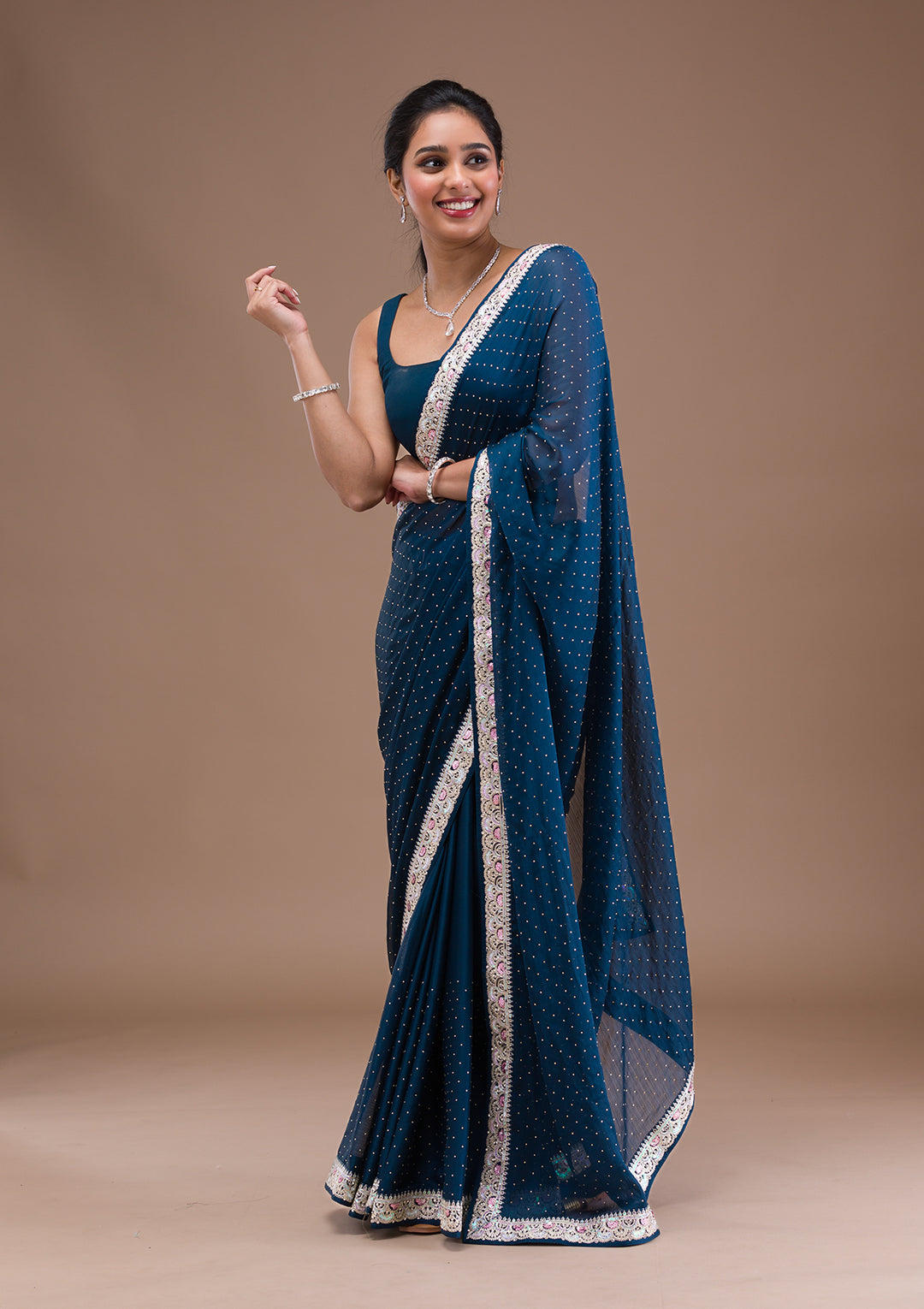 Peacock Blue Zariwork Semi Crepe Saree
