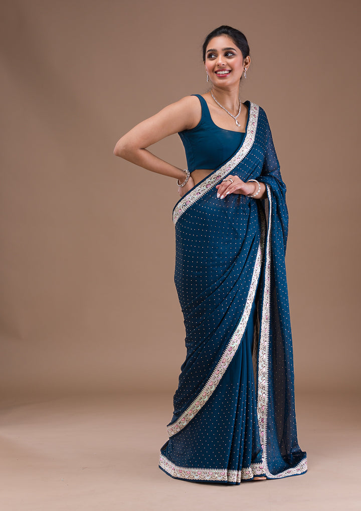 Peacock Blue Zariwork Semi Crepe Saree