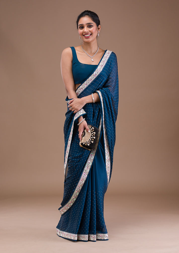 Peacock Blue Zariwork Semi Crepe Saree