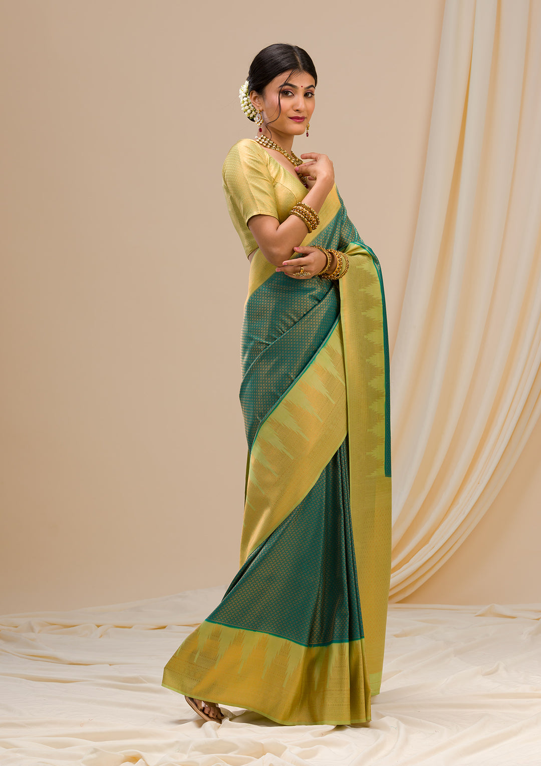 Peacock Green Zariwork Soft Silk Saree