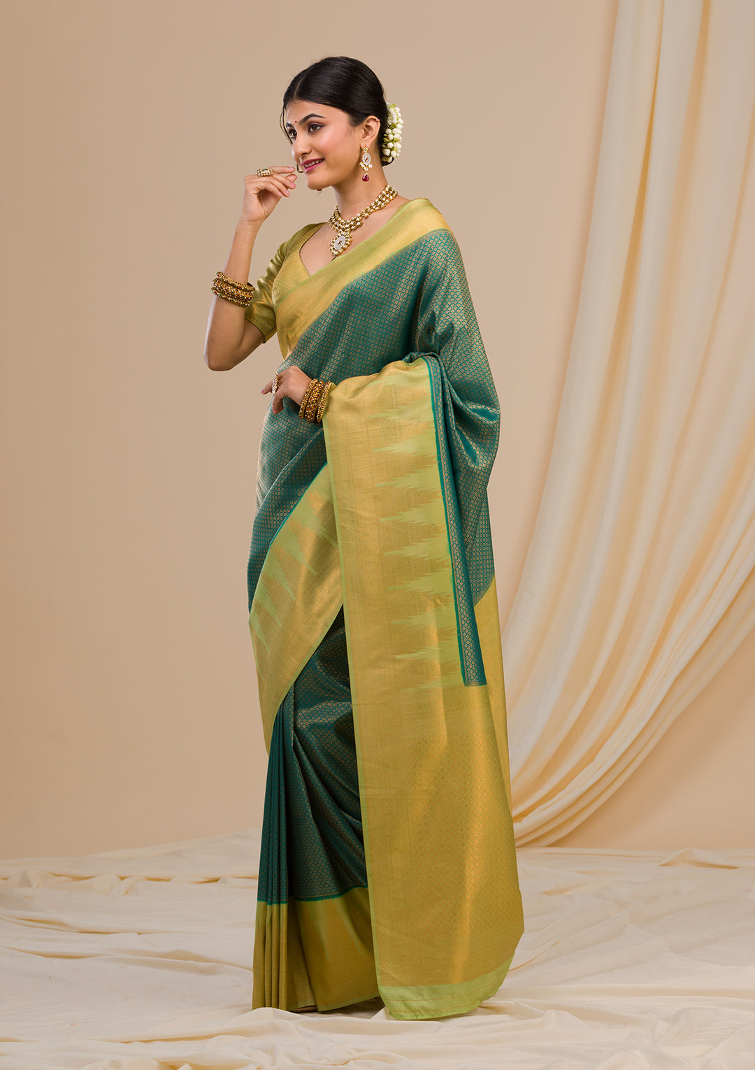 Peacock Green Zariwork Soft Silk Saree
