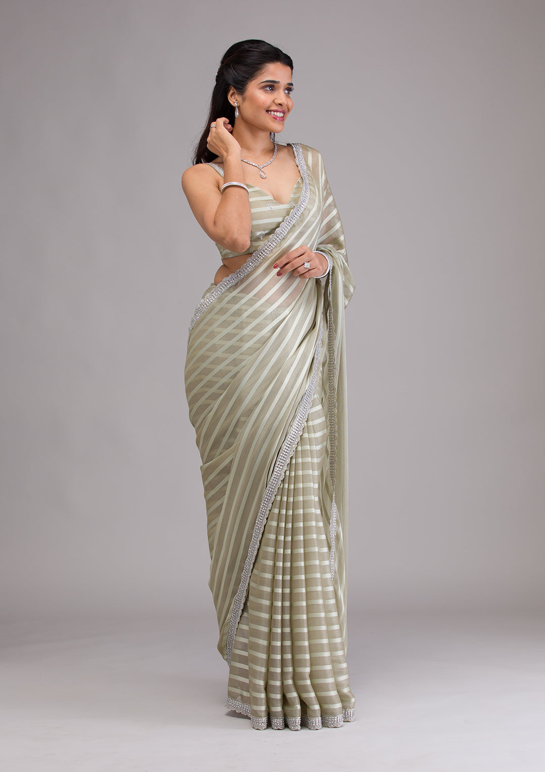 Pista Green Stonework Semi Crepe Saree