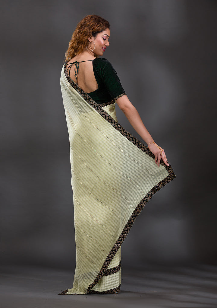 Pista Green Swarovski Georgette Saree