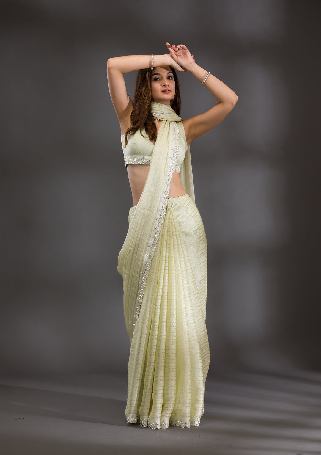 Pista Green Swarovski Georgette Saree