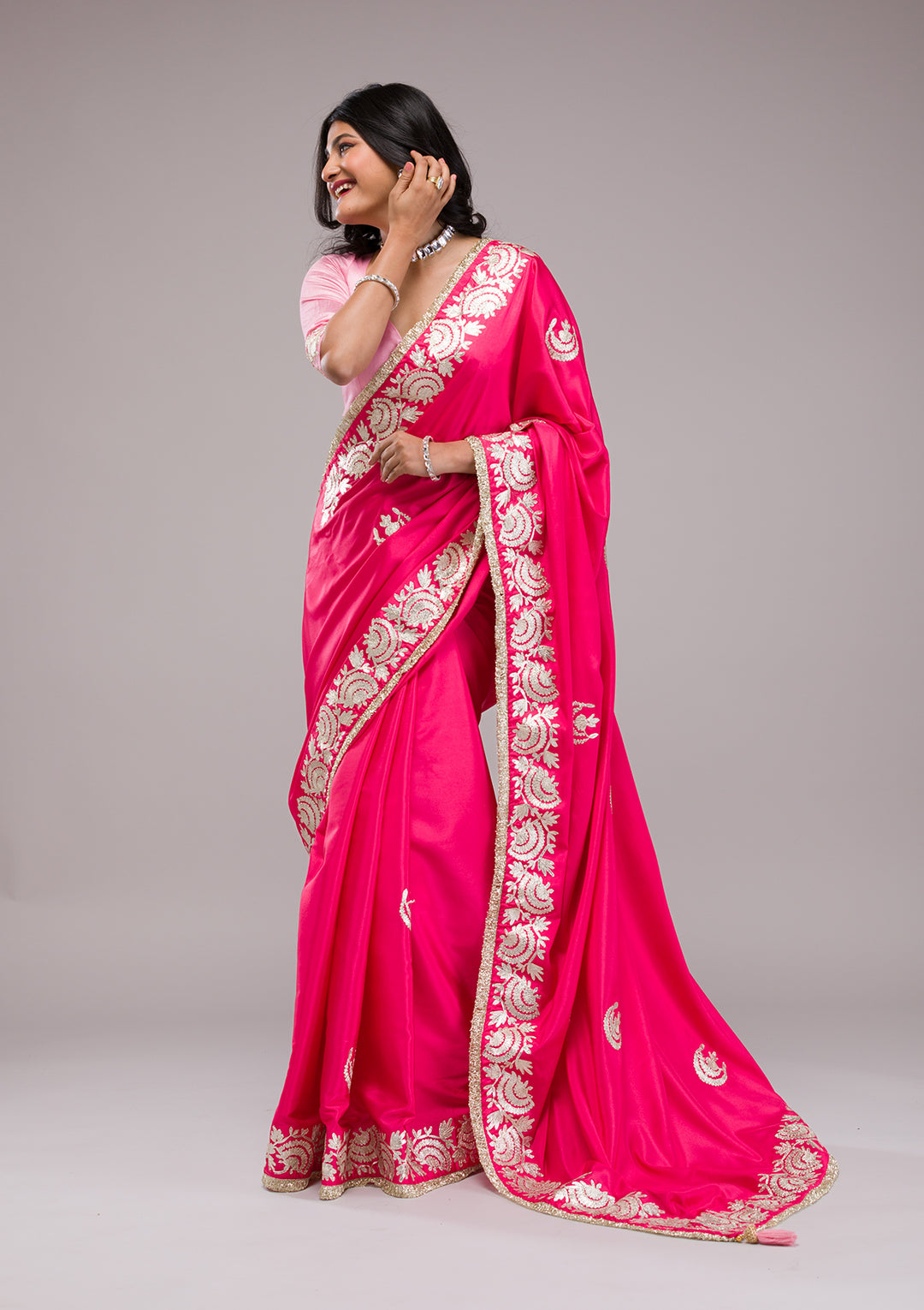 Rani Pink Zariwork Semi Crepe Saree