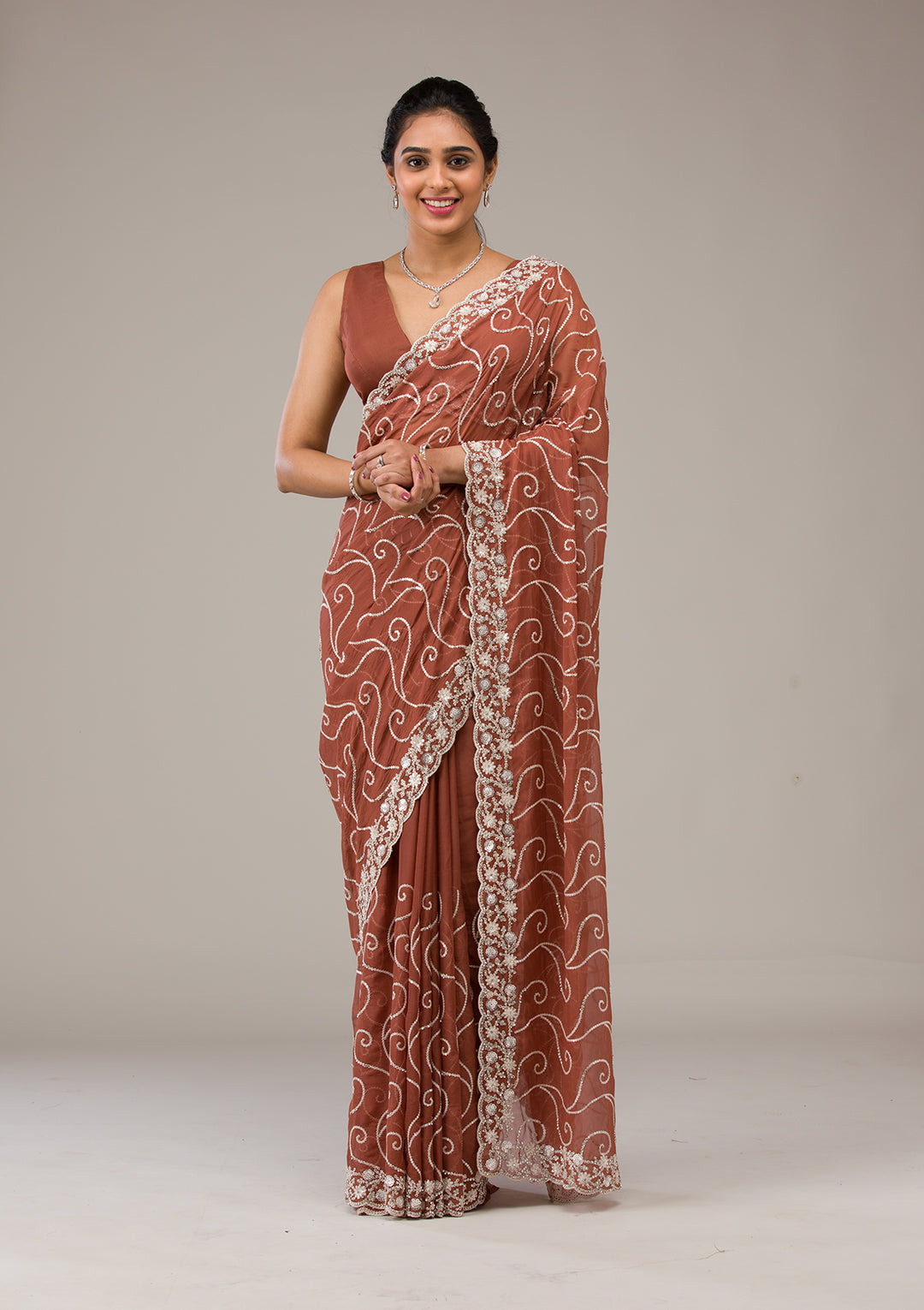 Rust Sequins Georgette Saree